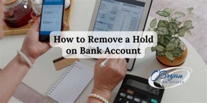 How do I remove a hold from my bank account?