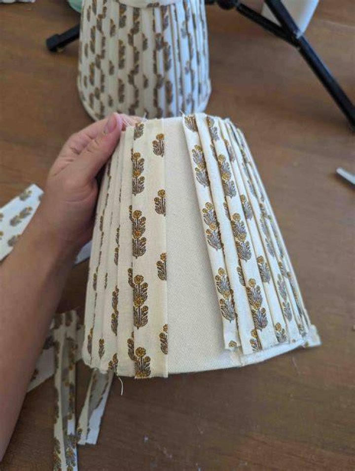 How do you cover a lampshade in fabric?