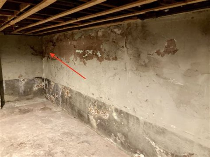 How do you repair an old concrete basement floor?